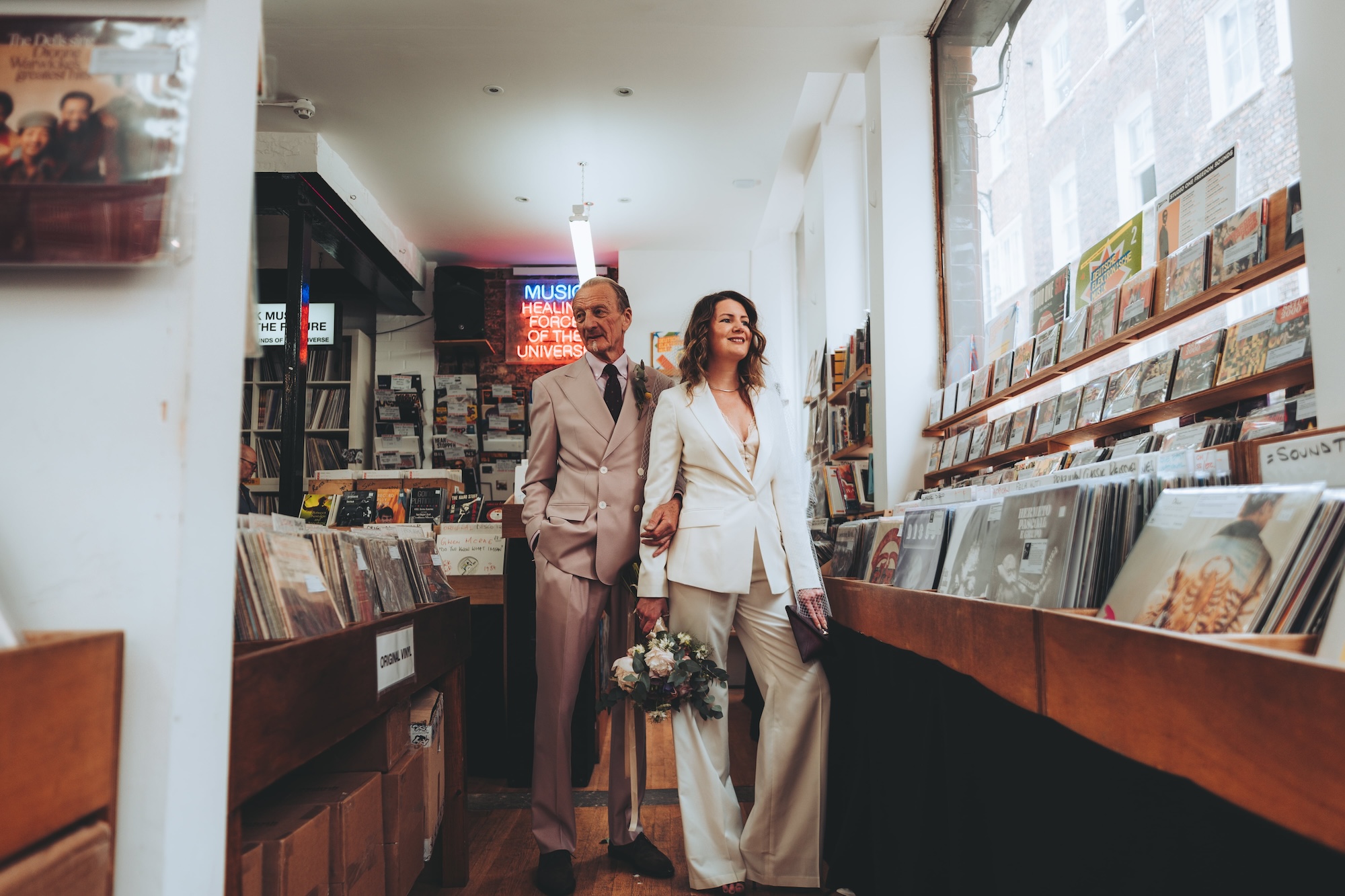 Nicole and Martin posing in record shop