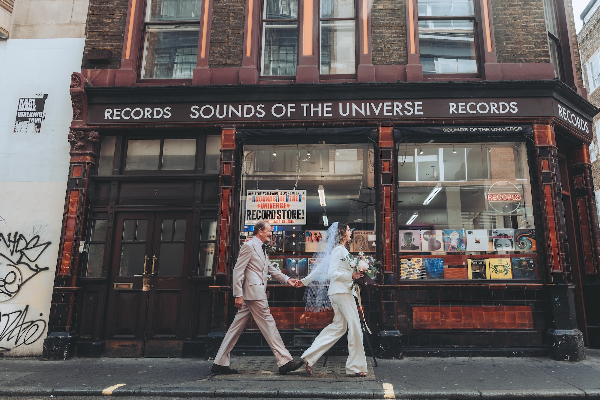 Nicole and Martin walking in Soho